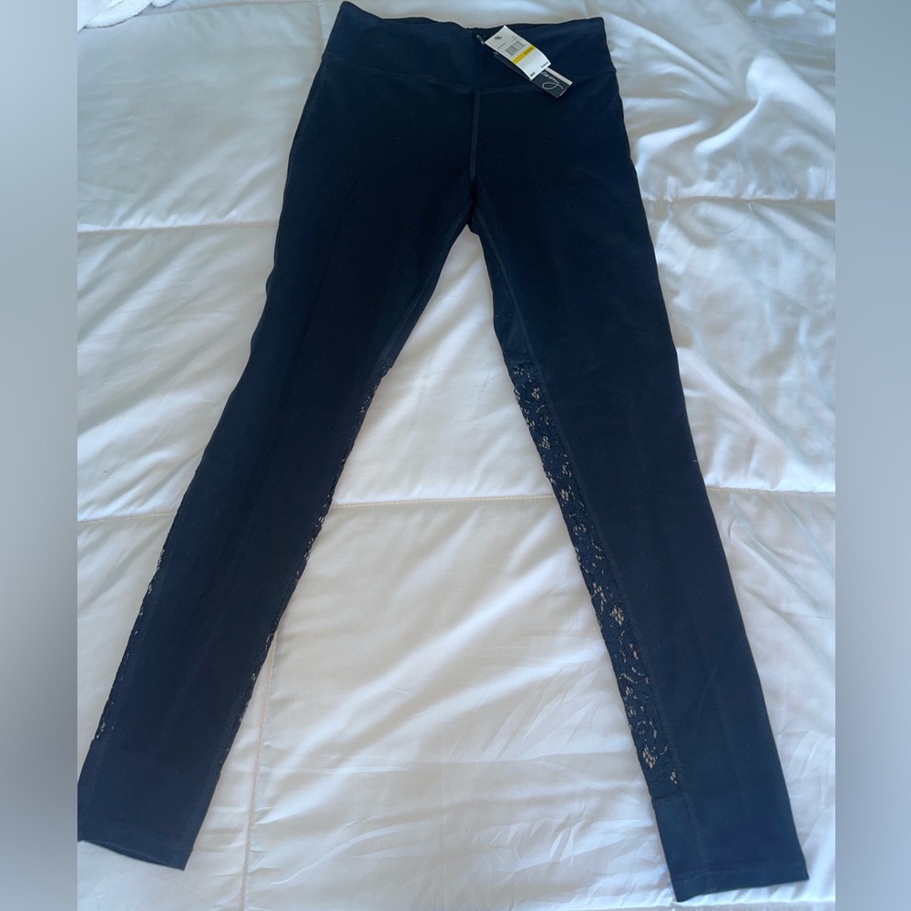 Black full length leggings with lace detailing on back